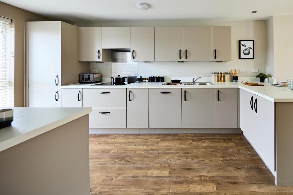 There&#39;s plenty of worktop space and storage in the spacious kitchen