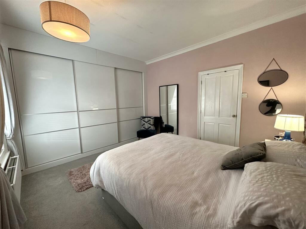 Bedroom One With Fitted Wardrobes 329