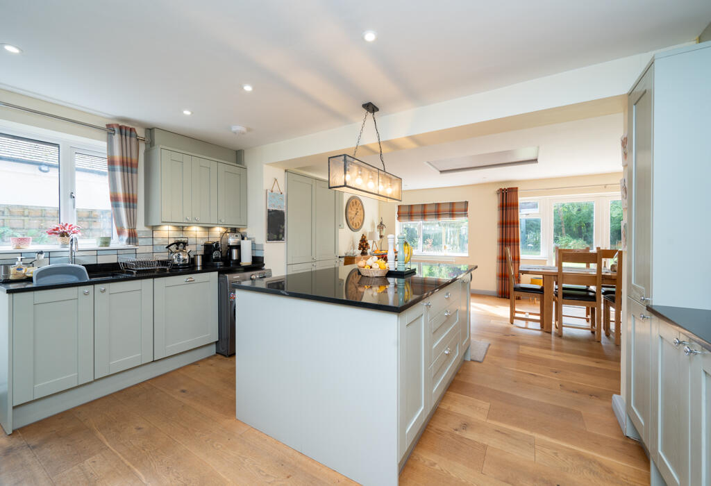 Kitchen with large island unit.