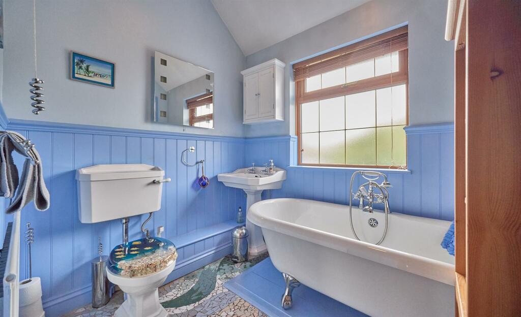 Family Bathroom to rear