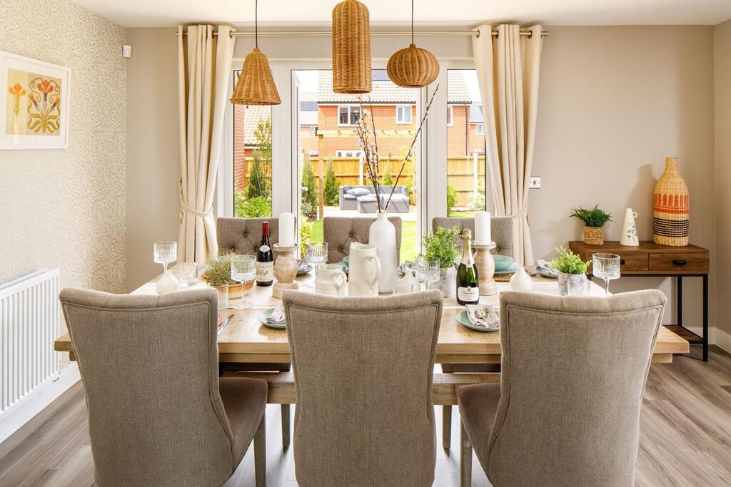 Your dining area looks over your garden through French doors