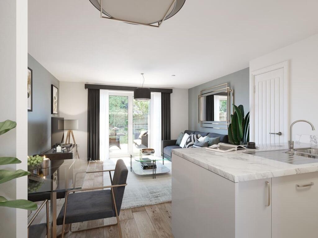 French doors leading from the kitchen to the rear garden