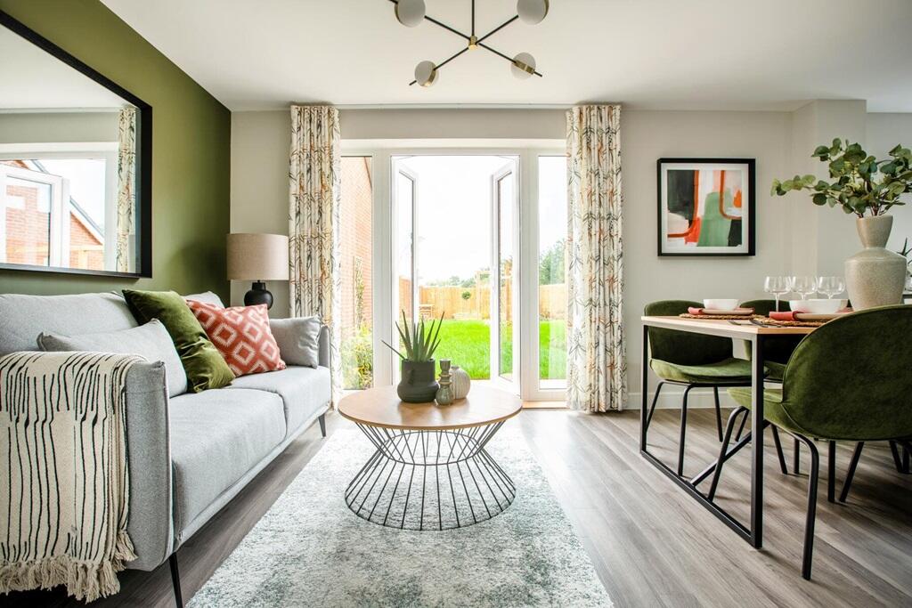 French doors in the kitchen/dining area open out onto the garden