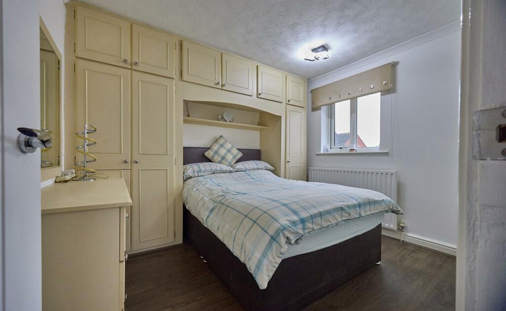 BEDROOM TWO TO REAR