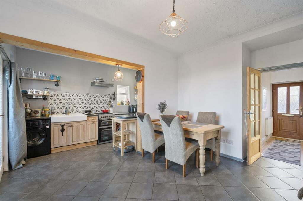 Dining area, kitchen and entrance hallway.jpg