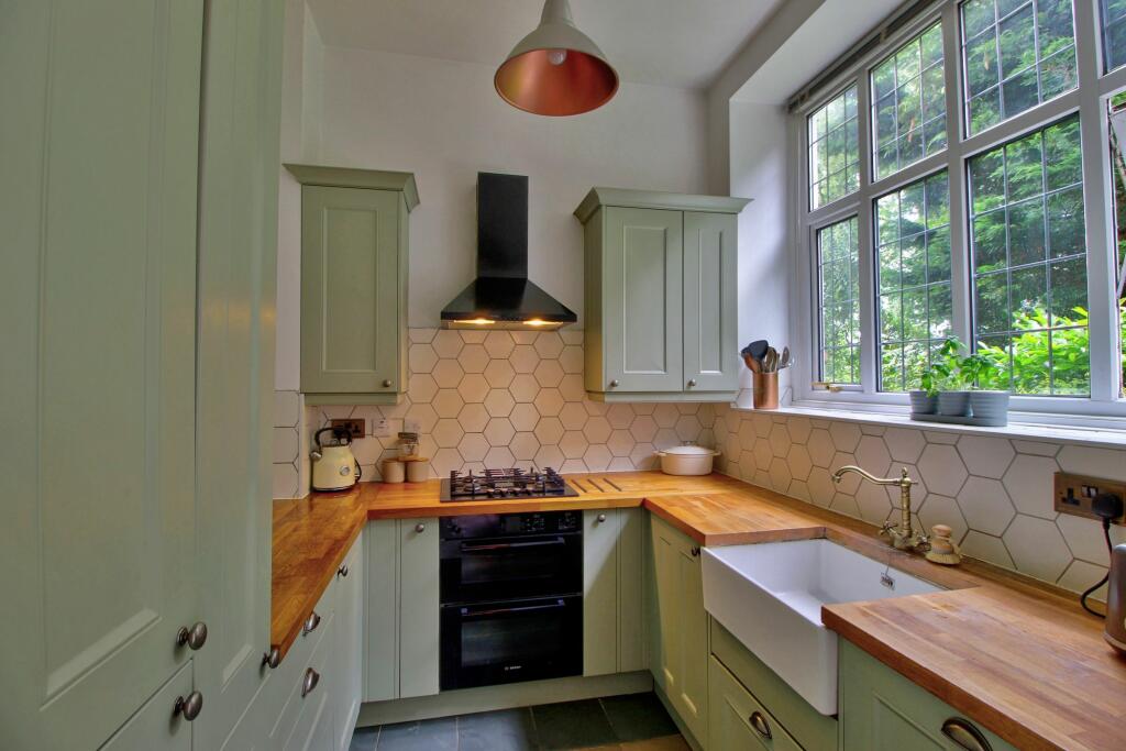 Timeless kitchen with green views