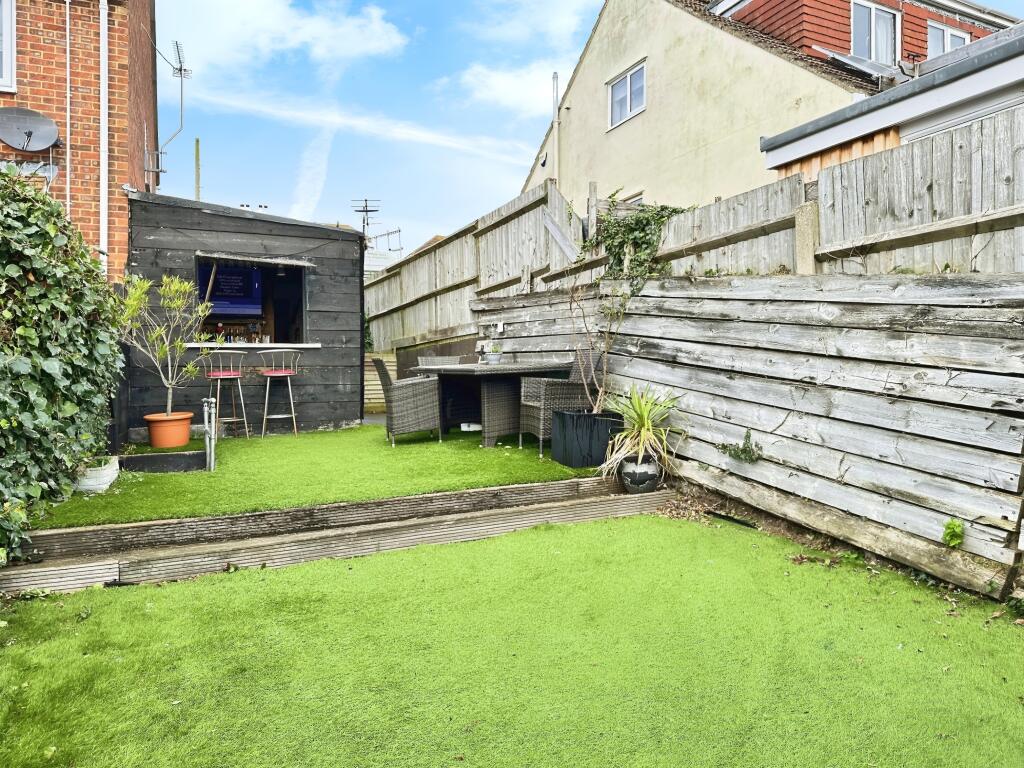 Private Front Garden With Bar Area View