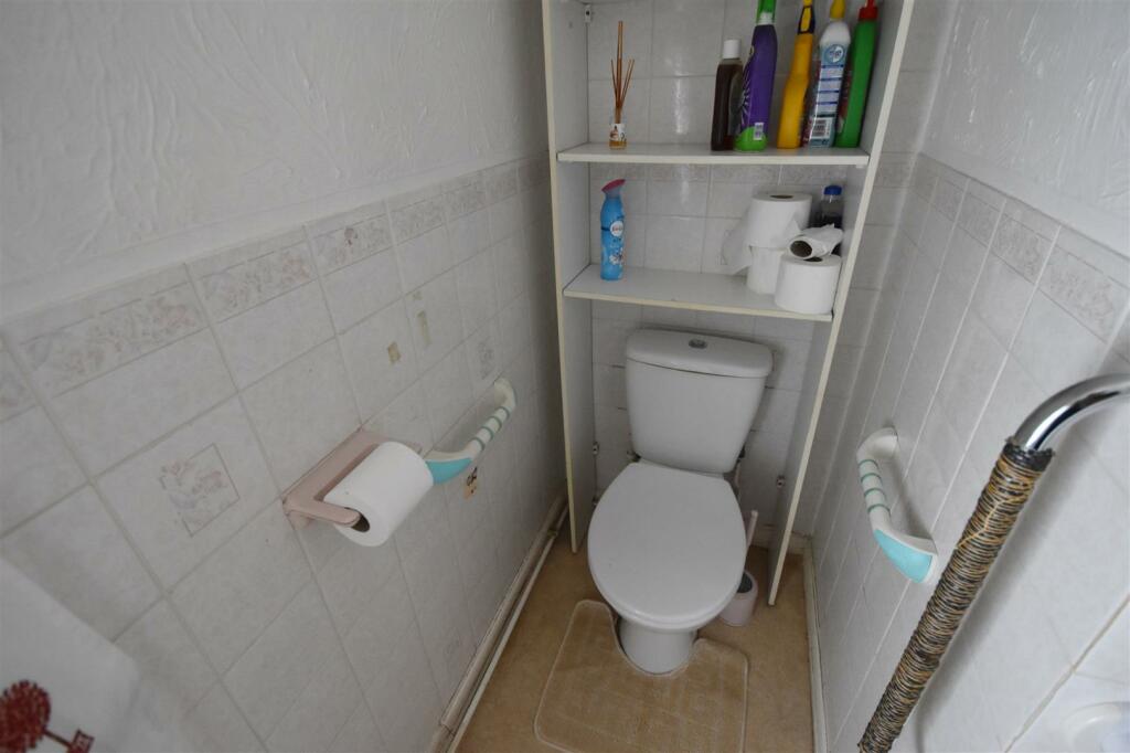 Toilet in bathroom.jpg