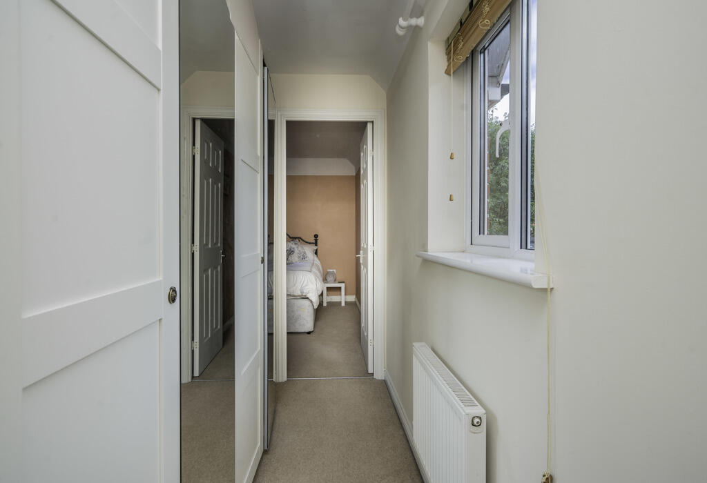 Hallway to third bedroom 