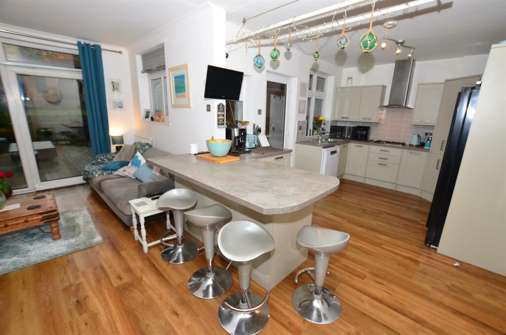 Dining Kitchen with Family Media Room