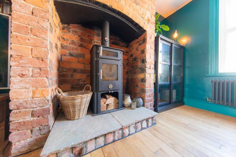 Log burning stove and fireplace