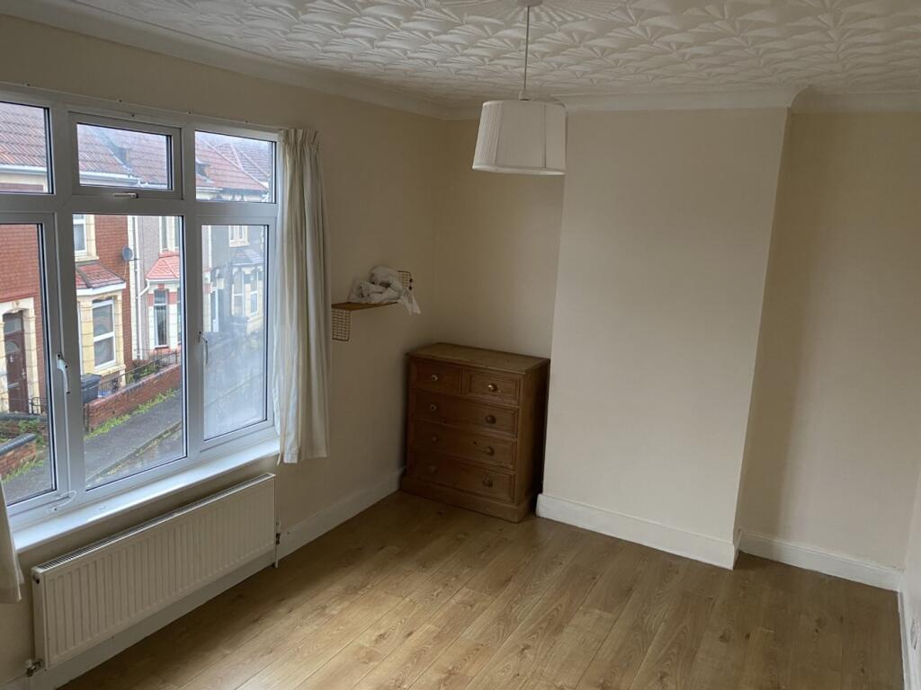 A bright and tidy double bedroom with ample nat...