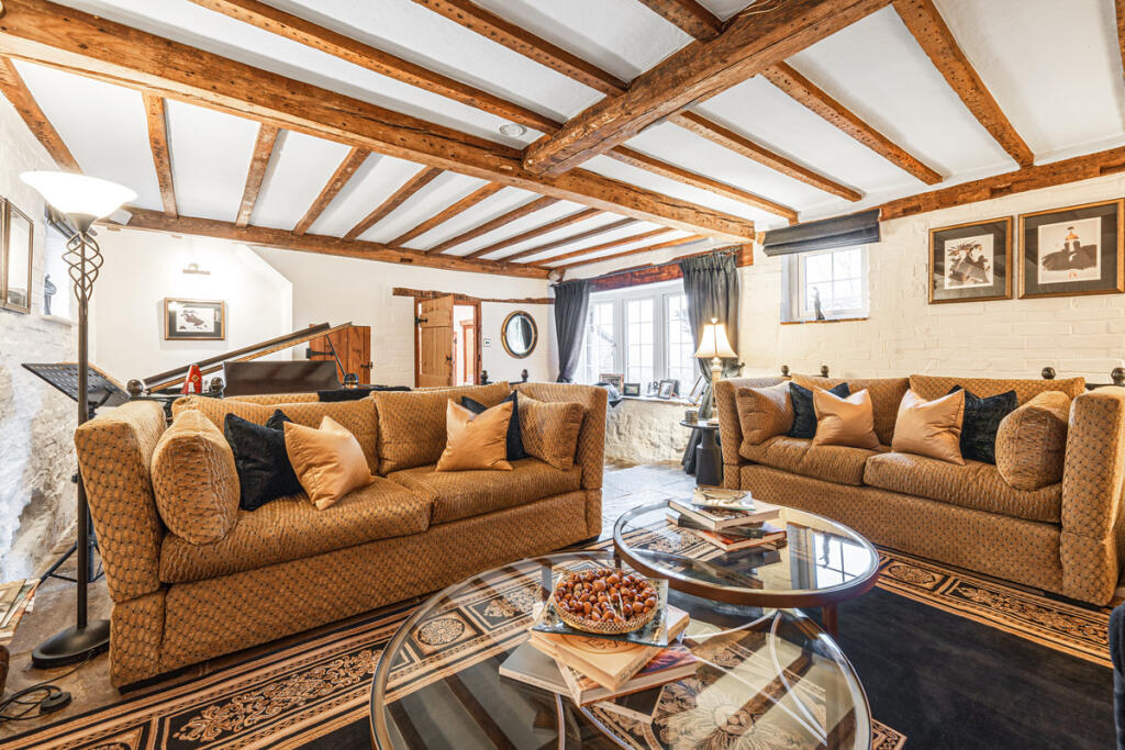 Sitting Room with inglenook fireplace and woodburner