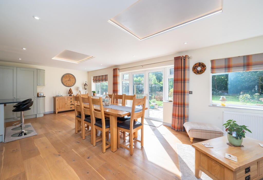 Large open plan dining area over looking garden.