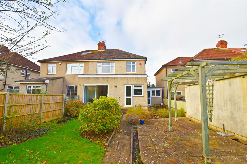 Rear view of property and patio.jpg