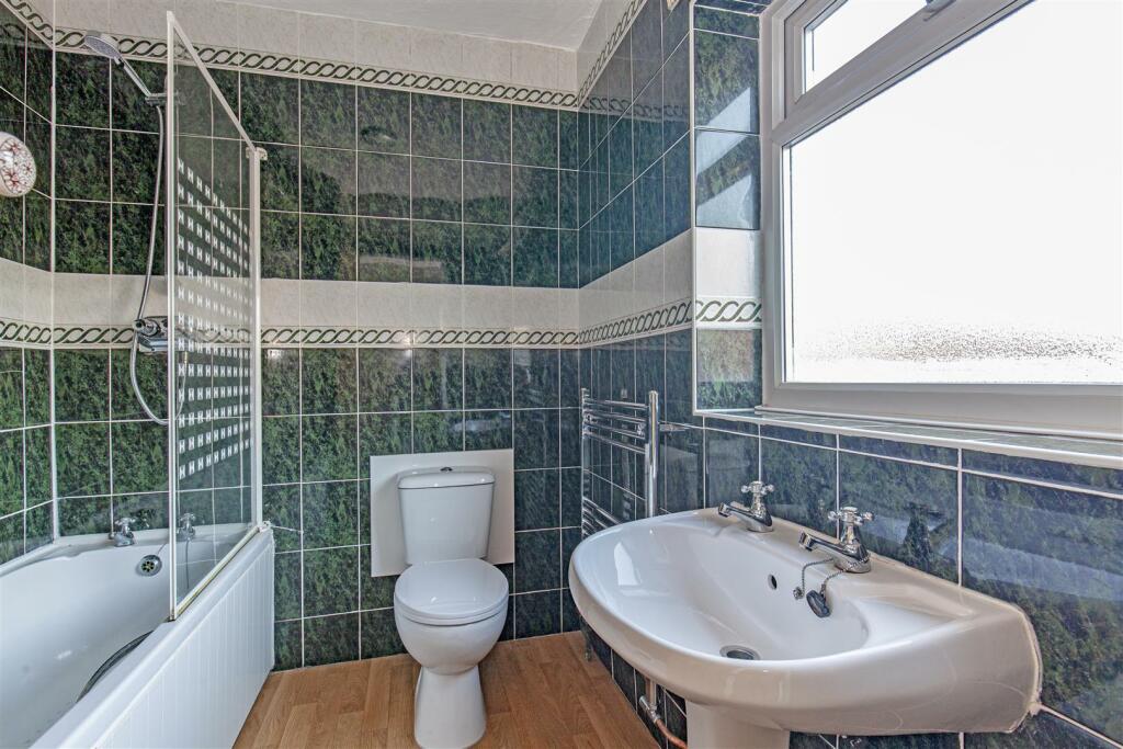 Fully Tiled Family Bathroom