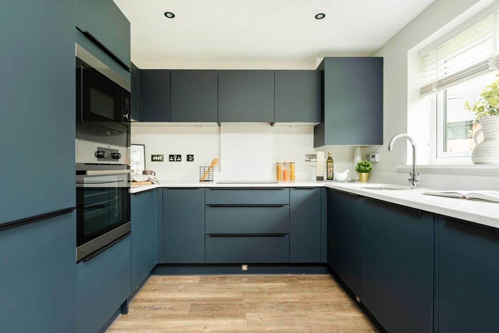 A modern kitchen with plenty of storage and cooking space