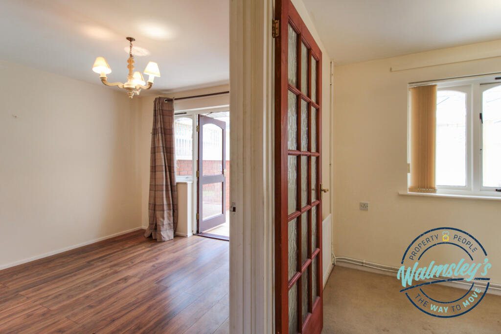 Bedroom two and one (leading to conservatory)