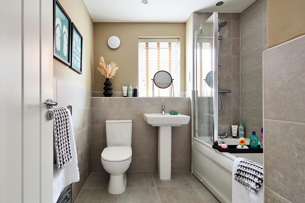 A family bathroom completes the home