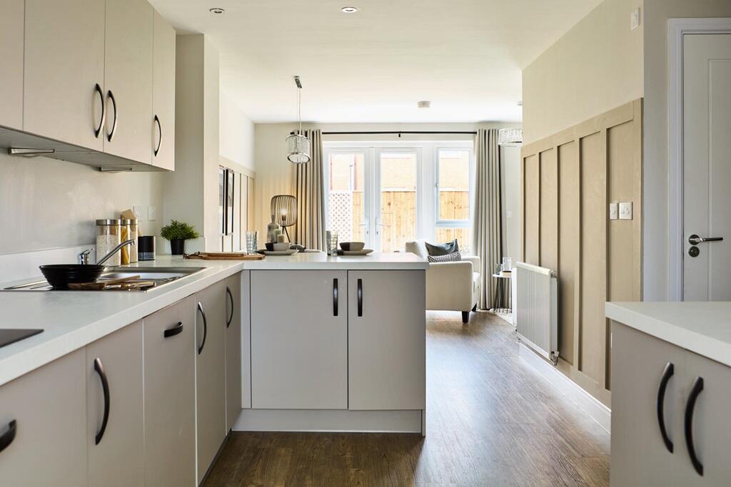 Downstairs is flooded with light from the french doors leading to the garden