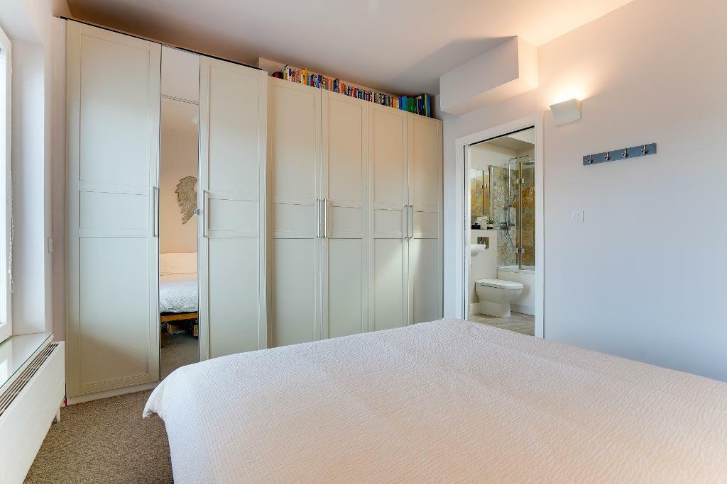 Main bedroom with fitted wardrobes