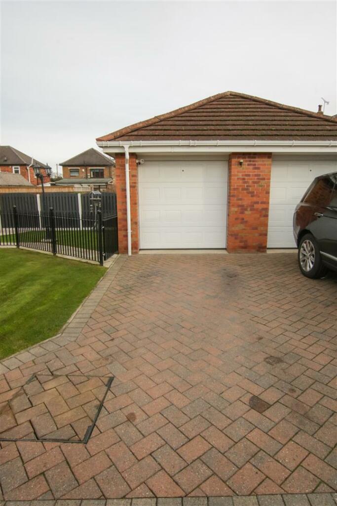 DETACHED BRICK GARAGE