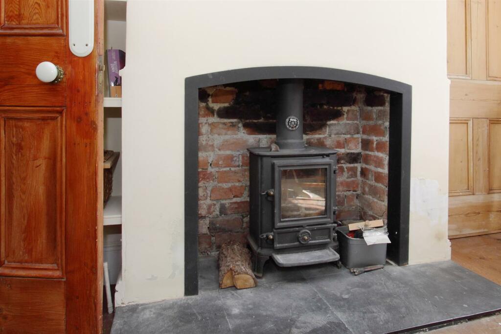 Log Burner in Dining Room