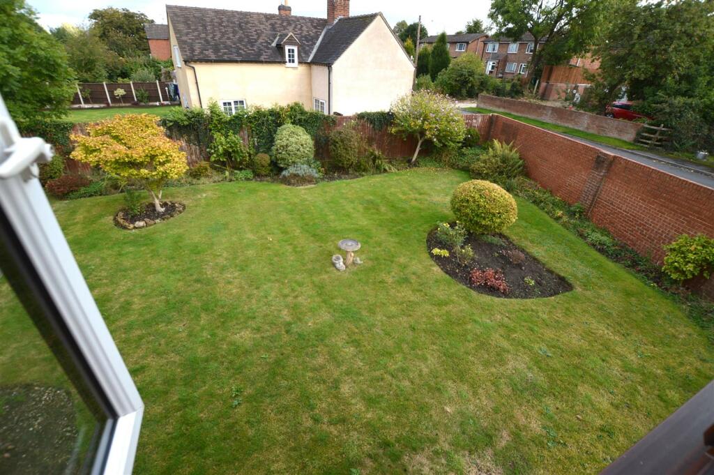 The view of the garden from Bedroom One