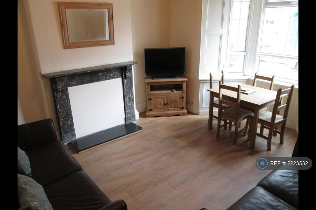 Spacious Living Room With Dining Table