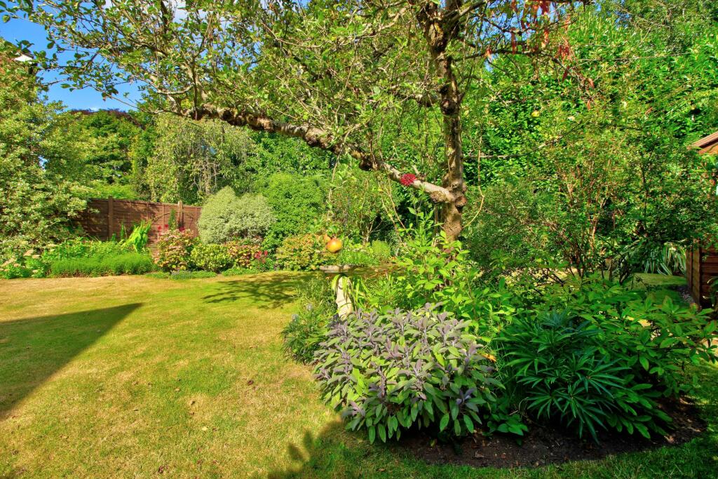 Beautifully-kept garden with fruit trees