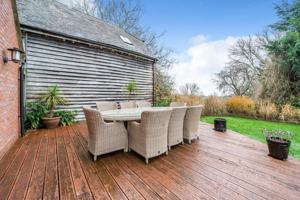 Decked outside seating area with wonderful views over Ashdown Forest