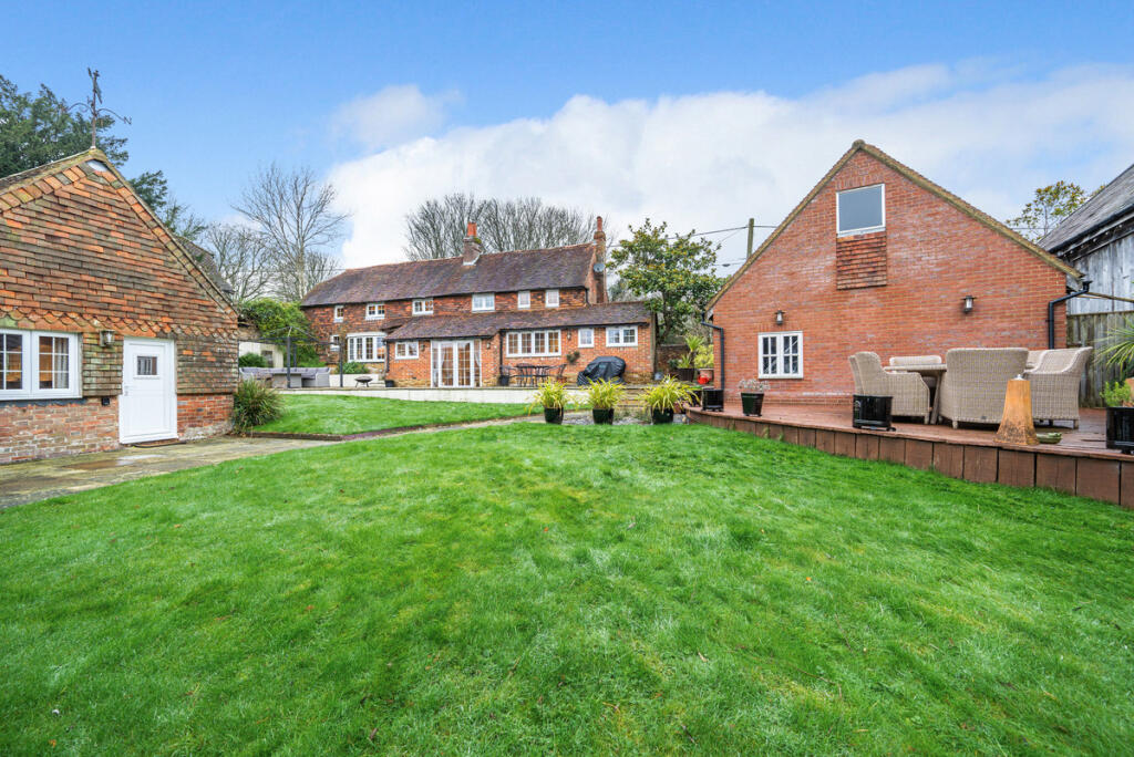 Private rear garden with detached Guest / Annexe accommodation and detached garage