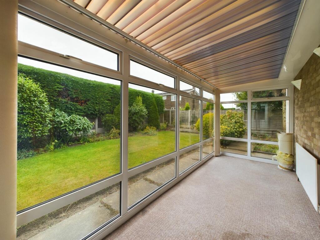 Conservatory with view of Back Garden