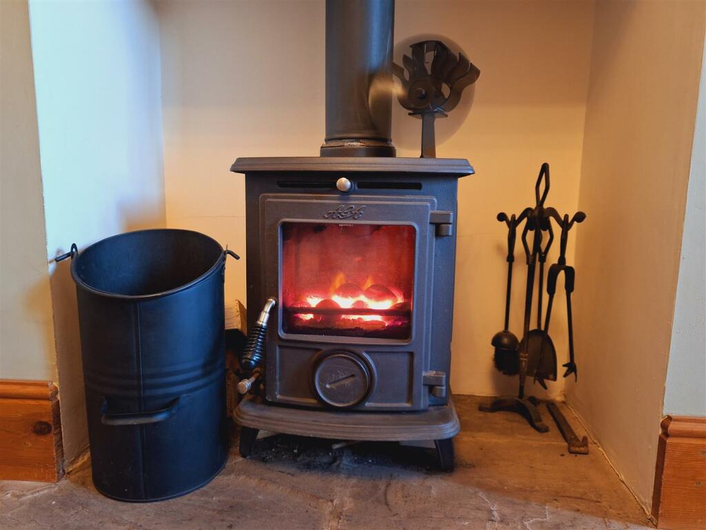 Log Burner in Dining Room