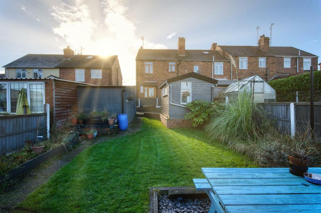 Rear garden and rear of the home.jpg