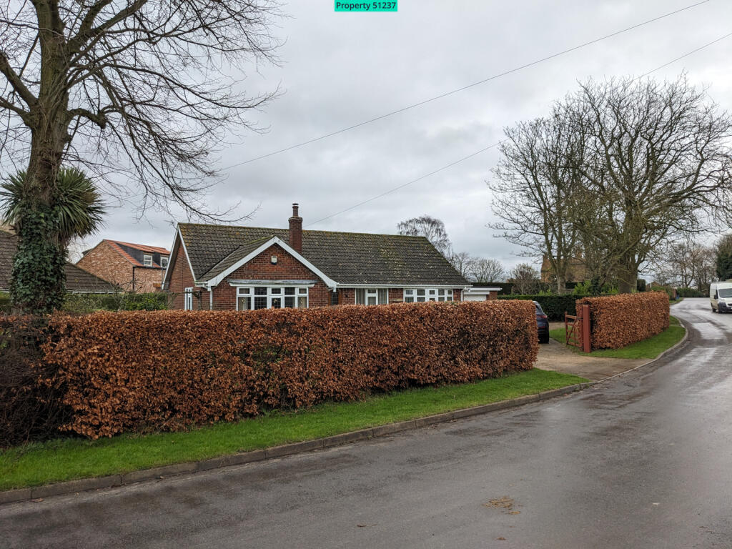 Road view of the property