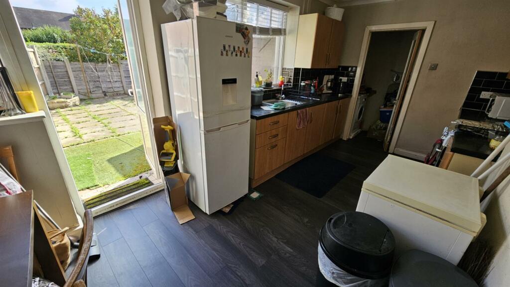 Dining Area to Kitchen