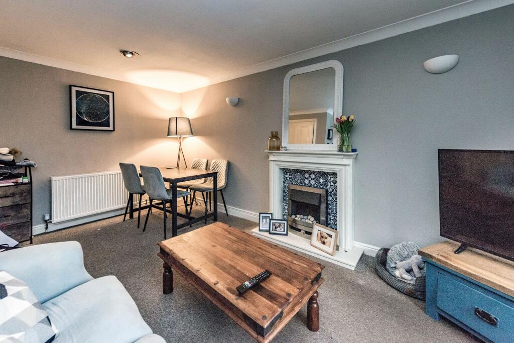 SITTING ROOM AND KITCHEN