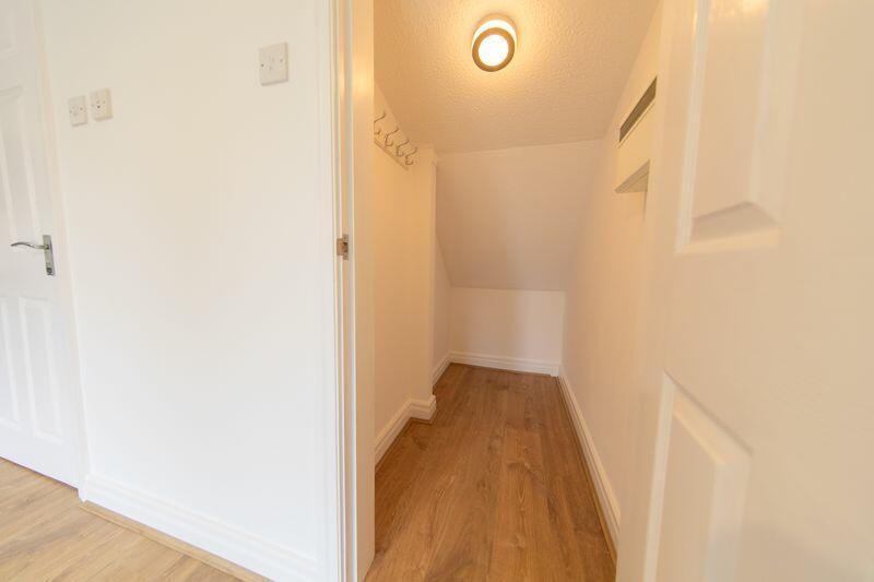 Under stair cloak/larder cupboard